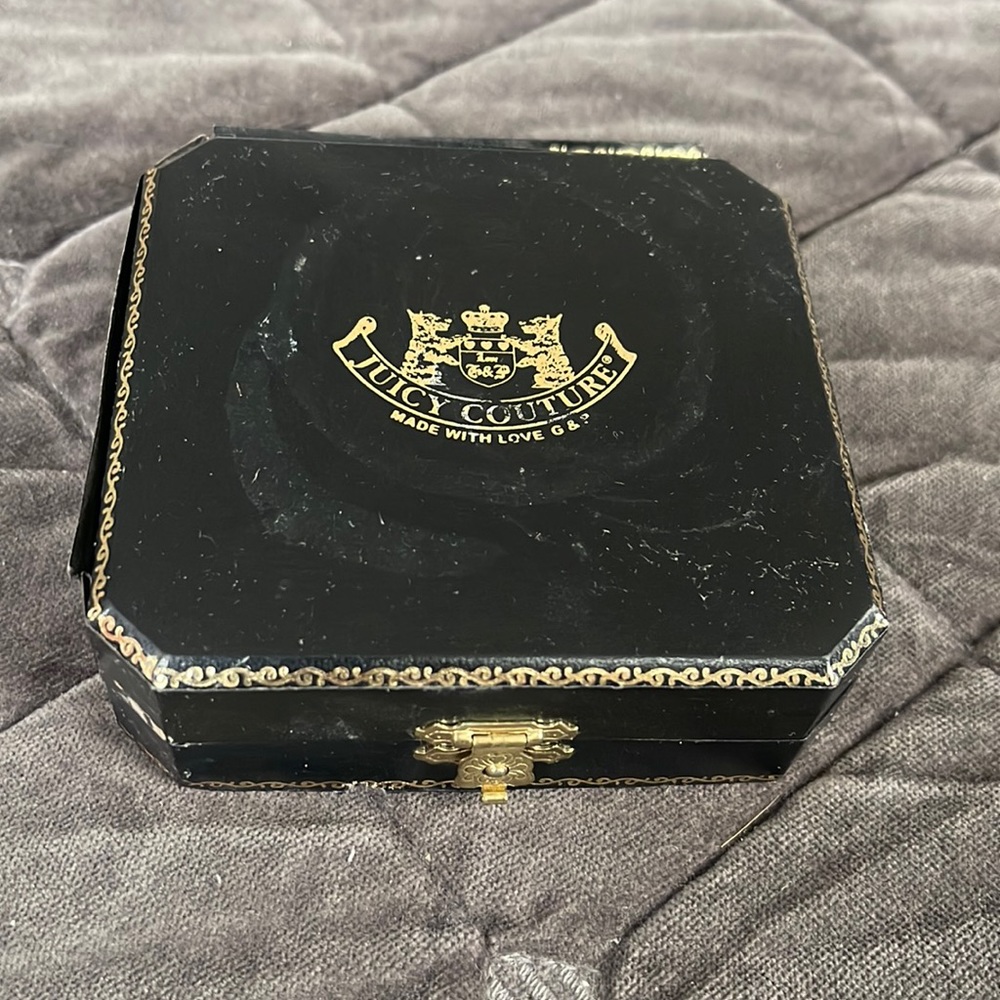 Costume Jewlery vintage juicy couture earrings never worn. Had in storage